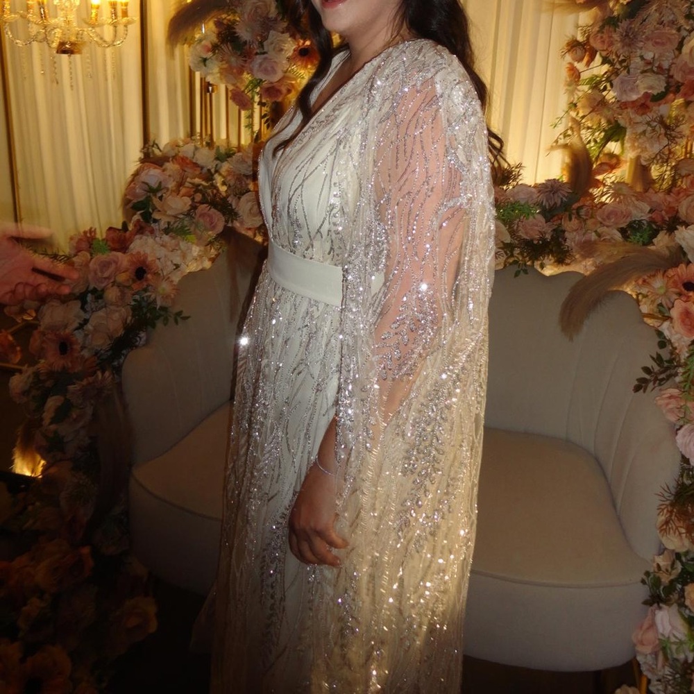 Beautiful Ivory cape dress